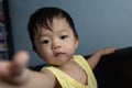 Adorable and happy Chinese 1 year old baby boy child playing on bed Royalty Free Stock Photo