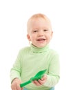 Portrait of adorable joyful boy with toy shovel Royalty Free Stock Photo