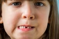 Portrait of adorable kid missing her first milk tooth.  Lifetime moments and happy childhood concept. Close up Royalty Free Stock Photo