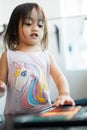 Portrait of adorable little asian girl being creative and working on a painting for artwork. Confidence Positivity Freedom Be Royalty Free Stock Photo