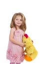 Portrait of an adorable little girl holding a yellow plush toy