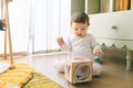 adorable 9 months old baby girl playing at home with educational toys Royalty Free Stock Photo