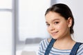 portrait of adorable preteen child looking at camera