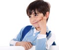 Portrait of a adorable school boy thinking Royalty Free Stock Photo