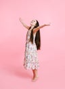 Portrait of adorable smiling little girl child dancing in dress Royalty Free Stock Photo