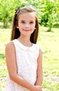 Portrait of adorable smiling little girl child outdoors