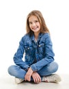 Portrait of adorable smiling little girl child preteen sitting isolated