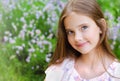 Portrait of adorable smiling little girl child in summer day. Happy preteen in the park Royalty Free Stock Photo