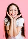 Portrait of adorable smiling little girl child in the white t-shirt isolated Royalty Free Stock Photo