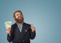 Man pumping fists holding money and pocket watch Royalty Free Stock Photo