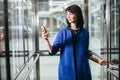 Adult businesswomen in suit using smartphone Royalty Free Stock Photo