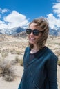 Portrait of Adult female wearing sunglasses on a windy summer day in the Alabama Hills in Lone Pine California, in the Eastern Royalty Free Stock Photo