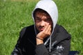 Portrait of adult guy in black windbreaker