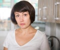 Sad woman tired of worries at kitchen Royalty Free Stock Photo