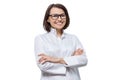 Portrait of adult smiling female cosmetologist doctor with crossed arms, white background, isolated