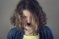 Portrait af angry scary evil young curly hair woman