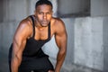 Portrait of african american athlete, urban fitness exercise and training, staring at camera with intense eyes Royalty Free Stock Photo