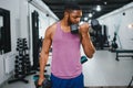 Portrait african american bodybuilder at gym intense intimidating glare expression conviction. Royalty Free Stock Photo