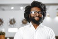 Portrait of african american businessman standing in hotel lobby Royalty Free Stock Photo