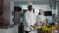 Portrait of african american chef cooking gourmet meal Royalty Free Stock Photo