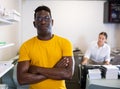 Portrait of african american confident typography owner in office