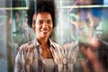 Portrait of african american female IT developer, programmer, designer working with programming code Royalty Free Stock Photo