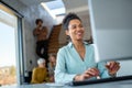 Portrait of african american female IT developer, programmer, designer working with programming code Royalty Free Stock Photo