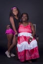 Portrait of an African American grandmother with her  granddaughter in an intimate and happy momen Royalty Free Stock Photo