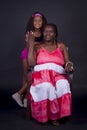 Portrait of an African American grandmother with her  granddaughter in an intimate and happy momen Royalty Free Stock Photo