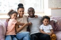 Portrait of african american happy family with two children. Royalty Free Stock Photo