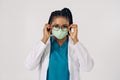 Portrait of african american nurse or doctor woman wearing medical face mask Royalty Free Stock Photo