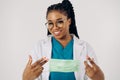 Portrait of african american nurse or doctor woman wearing medical face mask Royalty Free Stock Photo