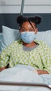 Portrait of african american patient wearing face mask