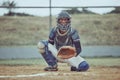 Portrait african american pitcher ready to make a catch with a mitt on a baseball field. Young sportsman in a helmet Royalty Free Stock Photo