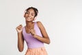 Portrait of african american woman using headphones and dancing Royalty Free Stock Photo