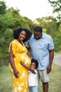 Portrait of an African American woman and her family.