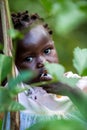 Portrait of an African baby in the forest.