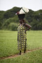 Portrait of an african lady wearing things on her head