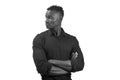 Portrait of an african man with arms crossed and looking to the side, back and white Royalty Free Stock Photo