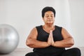 African mature woman practicing yoga Royalty Free Stock Photo