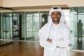 Portrait of African Muslim man wearing religious clothing an scarf at office Royalty Free Stock Photo