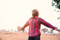 Portrait of african traveler smiling and enjoying his recreation time in nature.Concept of tourism day Royalty Free Stock Photo