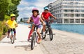 Cute African girl riding bicycle with her friends Royalty Free Stock Photo