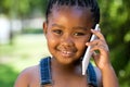 Portrait of African youngster talking on smart phone.