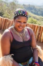 Portrait of an african zulu woman in traditional dress, hat, smiling. lifestyle South Africa