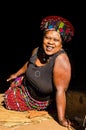 Portrait of an african zulu woman in traditional dress, hat, smiling. lifestyle South Africa