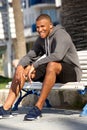 Afro american young male runner relaxing after fitness training Royalty Free Stock Photo