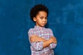 Portrait of afro kid boy hurt or upset offended sensitive.