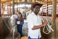 Portrait afro man horse farm worker Royalty Free Stock Photo