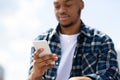 Portrait of afro person scrolling social media